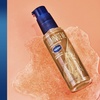 image:imageVaseline Illuminate Me Shimmering Body Oil Created for Melanin Rich Skin Illuminates Skin with Finishing Touch of Shimmer for Glowing Skin 33 oz33 Fl Oz Pack of 1